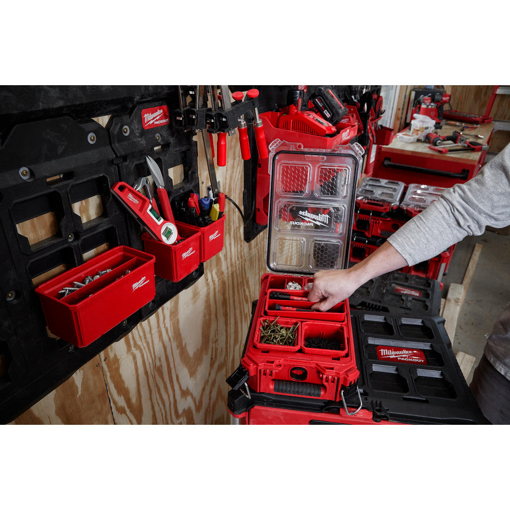 PACKOUT™ boxes and tools mounted on a wall in a shop settings