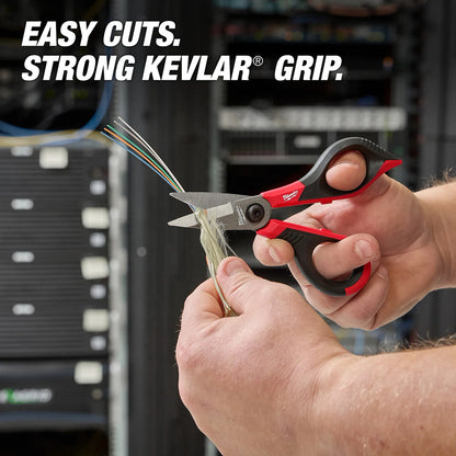 Person using a pair of red and black scissors with Kevlar grip to cut wires, with text 'Easy Cuts. Strong Kevlar Grip.'