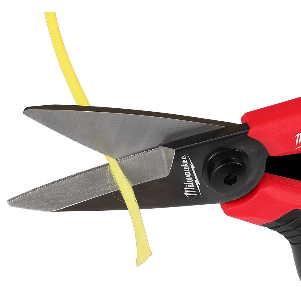 Milwaukee electric scissors cutting yellow wire on a white background