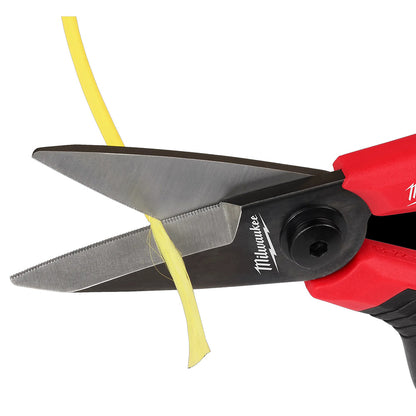 Milwaukee electric scissors cutting yellow wire on a white background