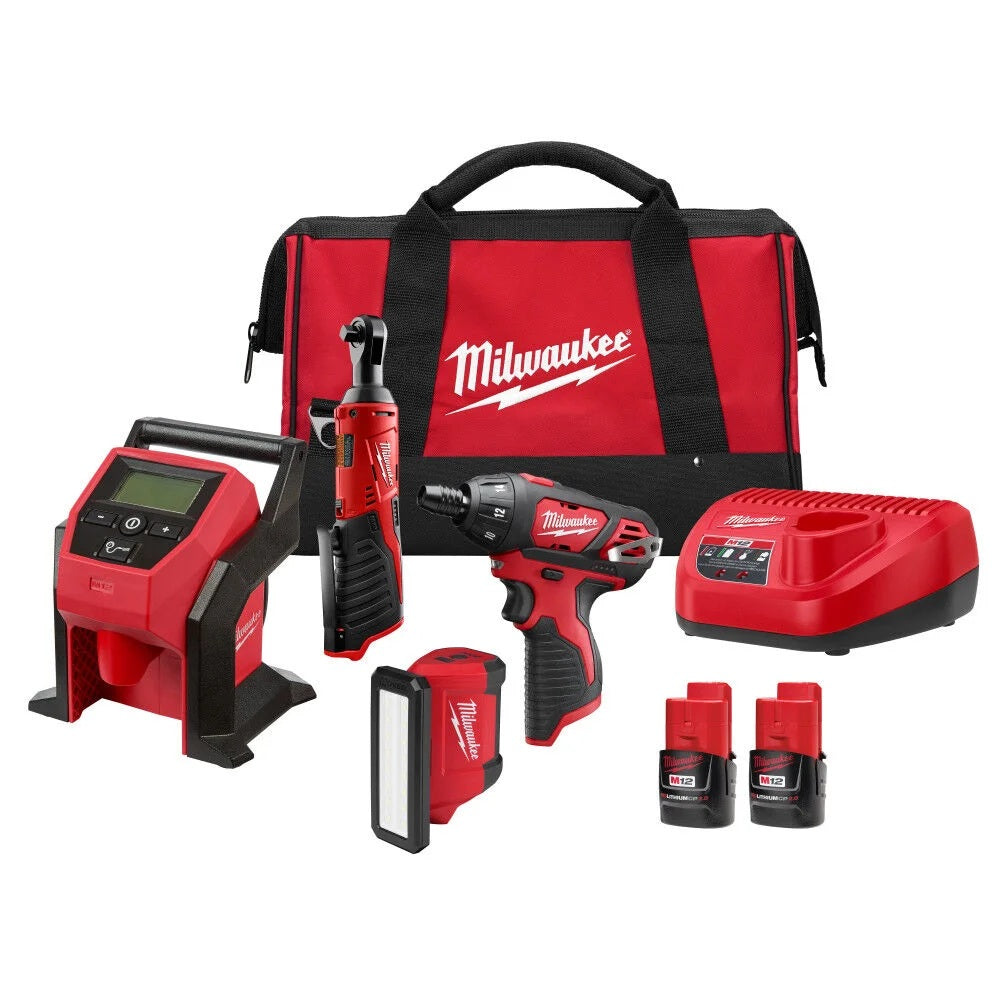 Milwaukee tool kit with various tools and a red bag on a white background