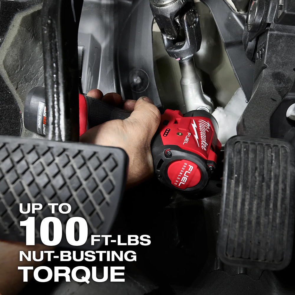 Person using a Milwaukee tool in a vehicle with text highlighting torque capability.