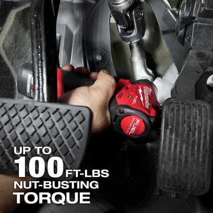 Person using a Milwaukee tool in a vehicle with text highlighting torque capability.