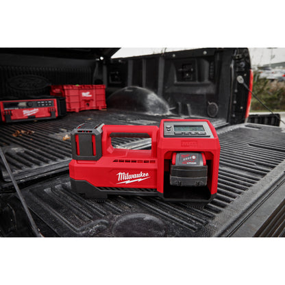 M18™ Inflator tool battery pack on a black truck bed.