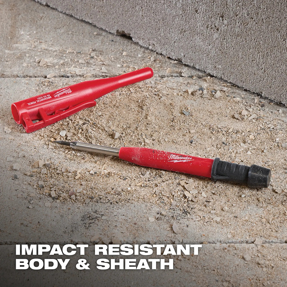 Red Milwaukee mechanical pencil on a concrete surface with 'Impact Resistant Body & Sheath' text.