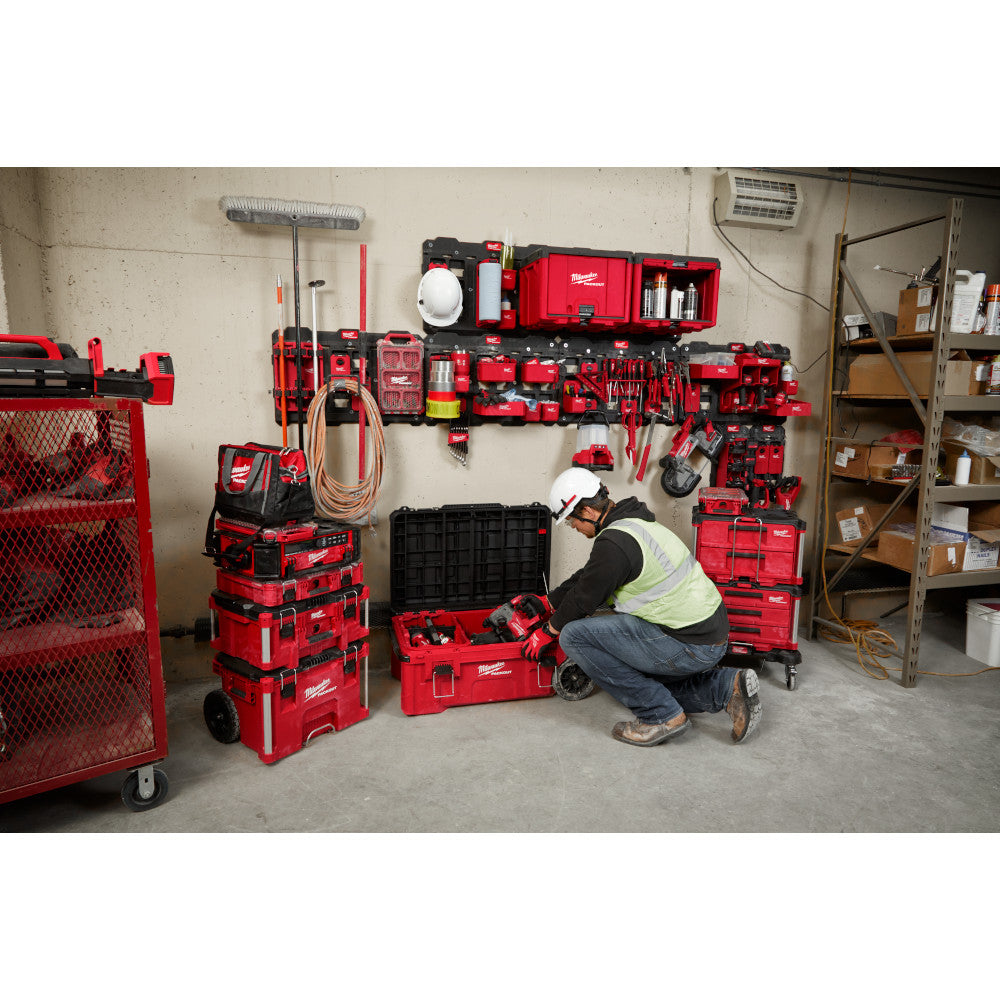 PACKOUT™ Compact Shelf next to other PACKOUT Boxes and Tools in a Workshop Setting