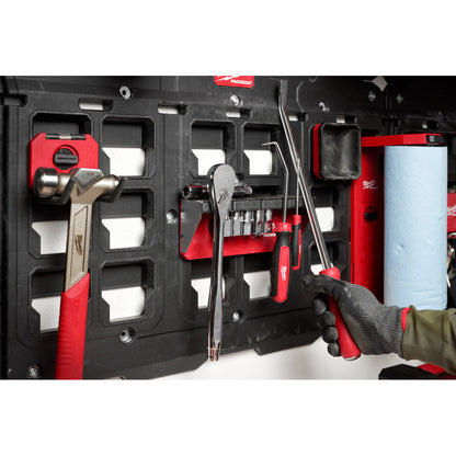 Tool organizer with various tools in a garage setting