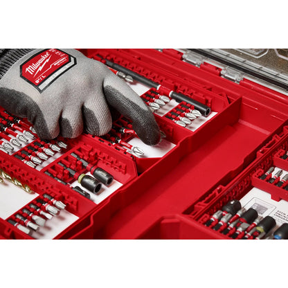 Red tool organizer with tools and a Milwaukee glove on a white background